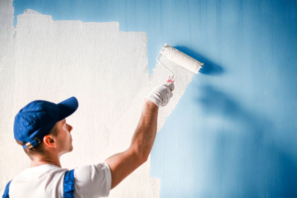 Man painting a house in Reno, Nevada