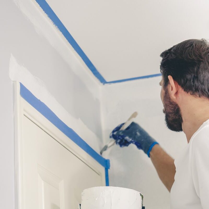 Painter applying primer to a wall in Reno, Nevada